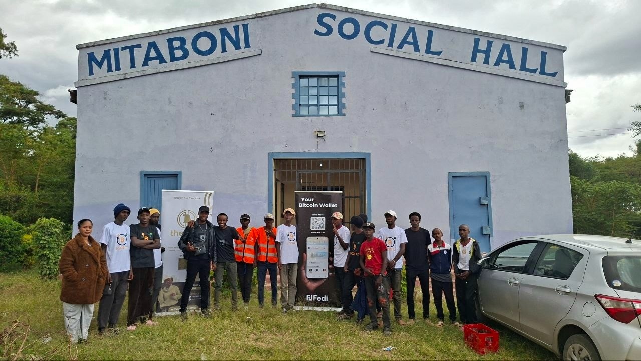Mukungu and Makini (fifth and sixth from the left) and team members from EcoBitz and The Core at the Mitaboni Social Hall