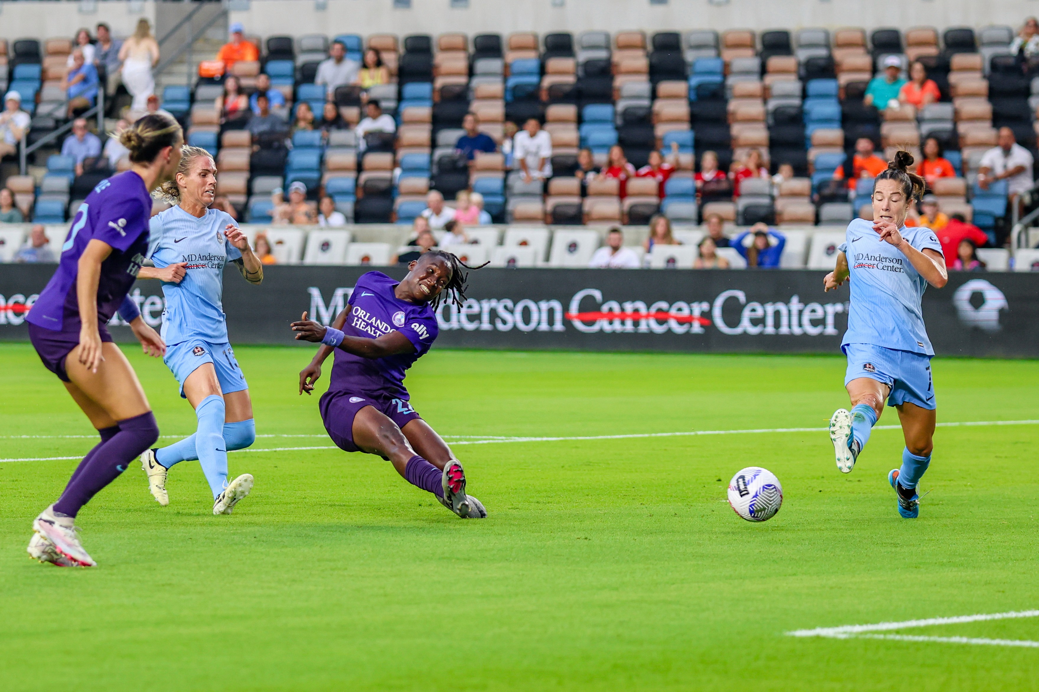 Barbra Banda (22) of the Orlando Pride takes a shot on goal during an NWSL game between the Houston Dash and the Orlando Pride at Shell Energy Stadium on August 23, 2024 in Houston. (Photo by Parker George/Undrafted)