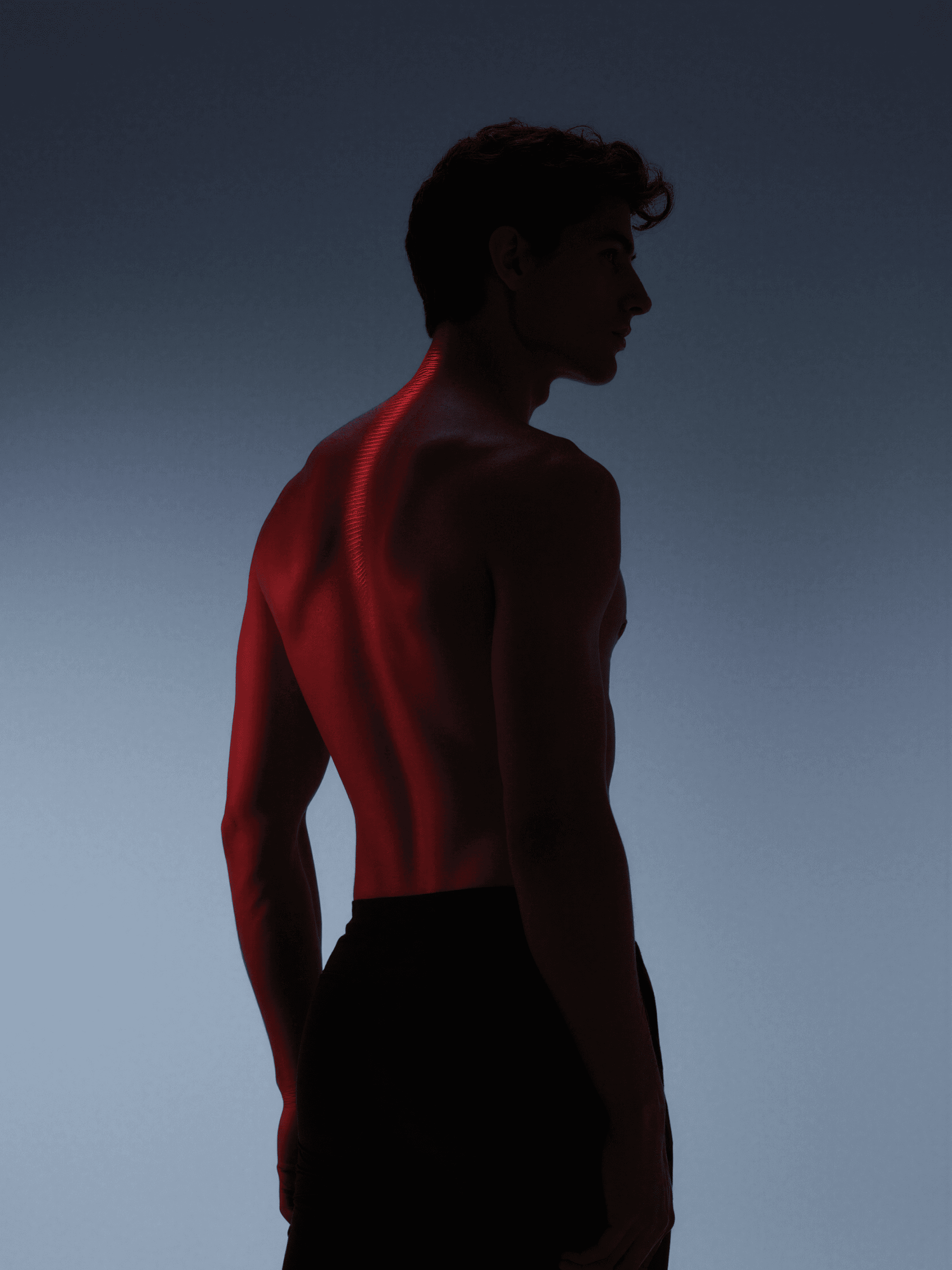 Generative visual for Withings, showcasing a red light-path scanning effect on a male model's back.