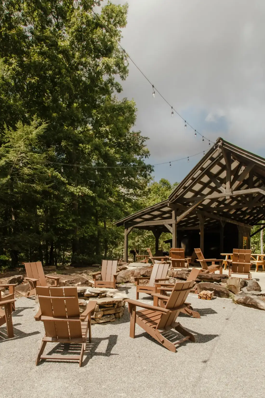 Adirondack chairs around a fire pit