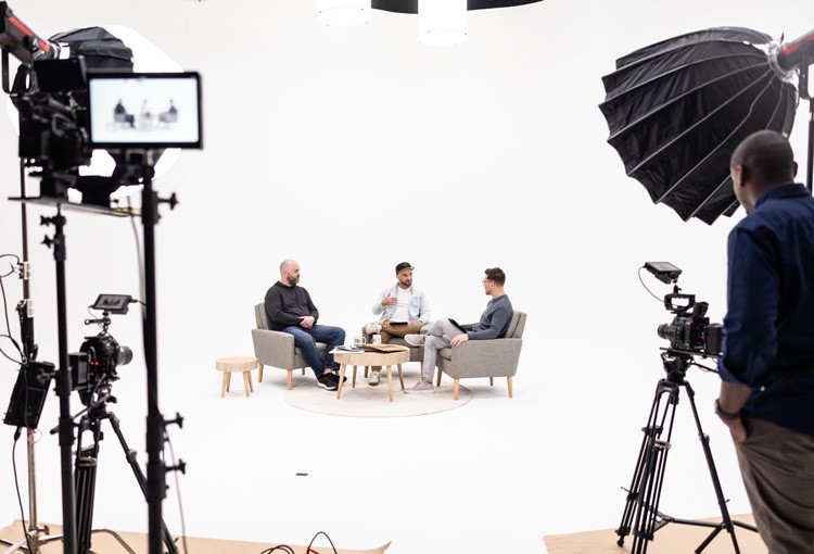 Photo of cast and crew on set of On the Record filming and recording