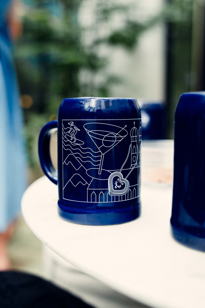 Close-up of a blue beer stein at a festive event