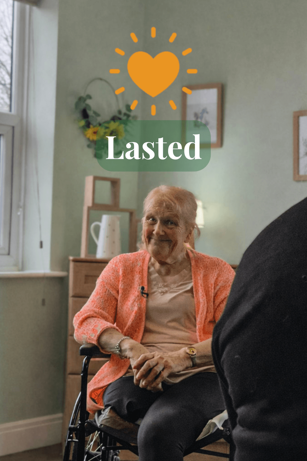 man in brown suit kissing woman in blue dress