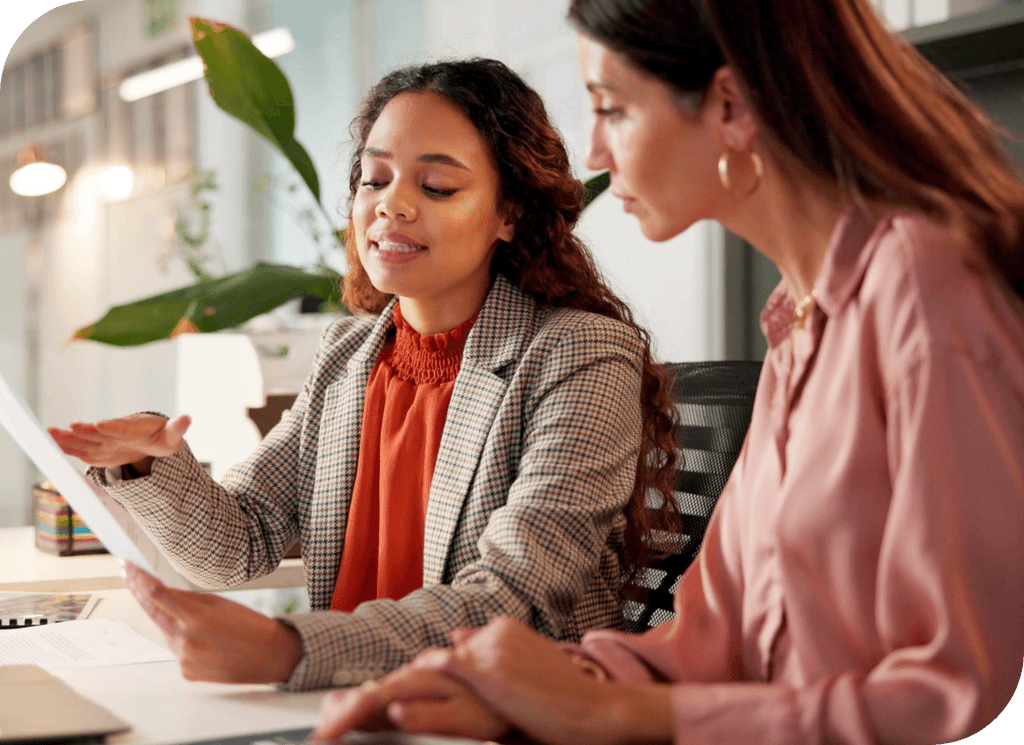Female consultant showing business owner growth marketing plan