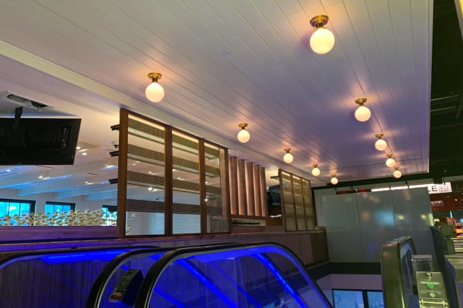 Small circular light fixtures on a ceiling