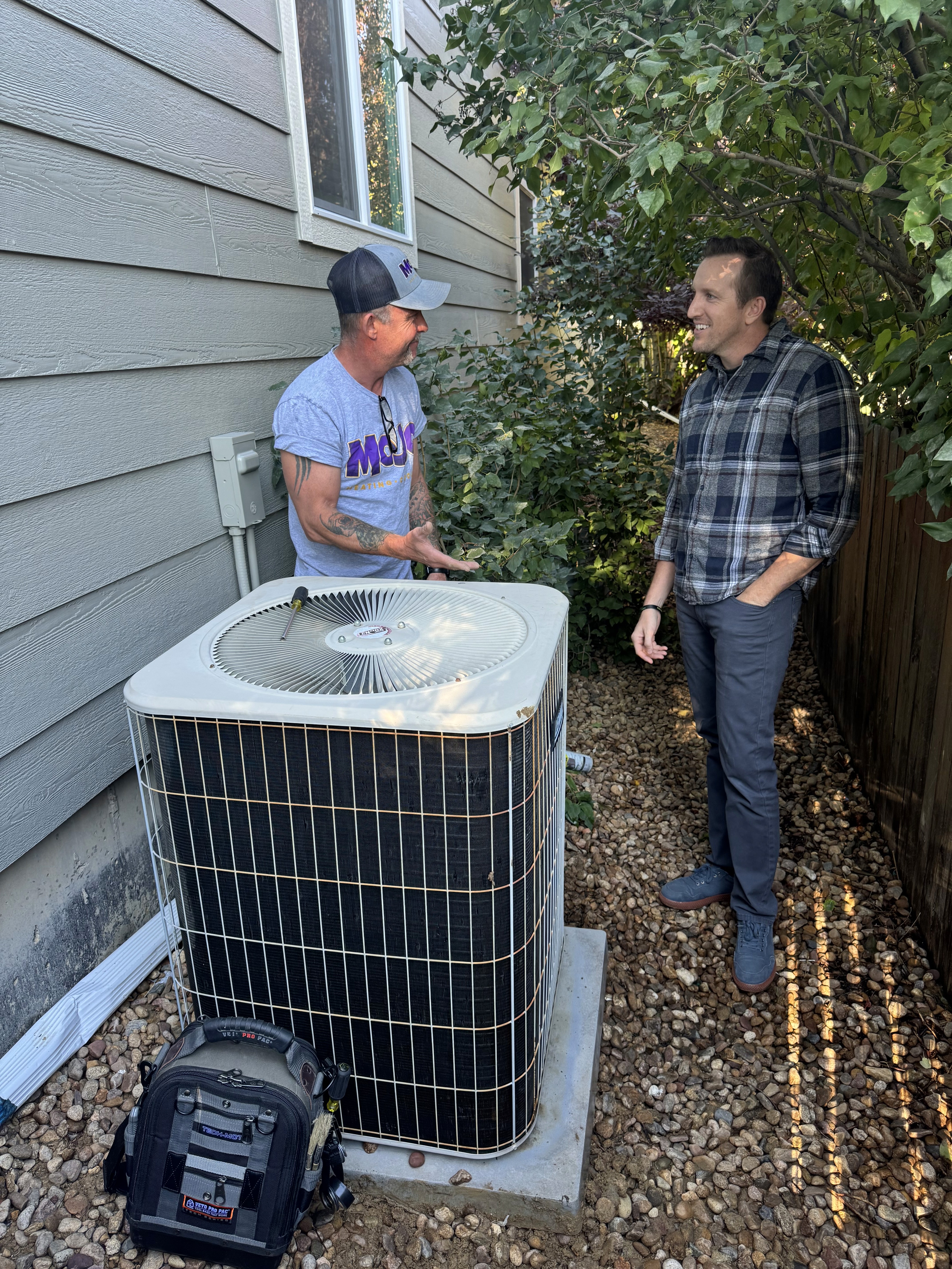 MoJo Your Home Technician Answering Questions to a Customer