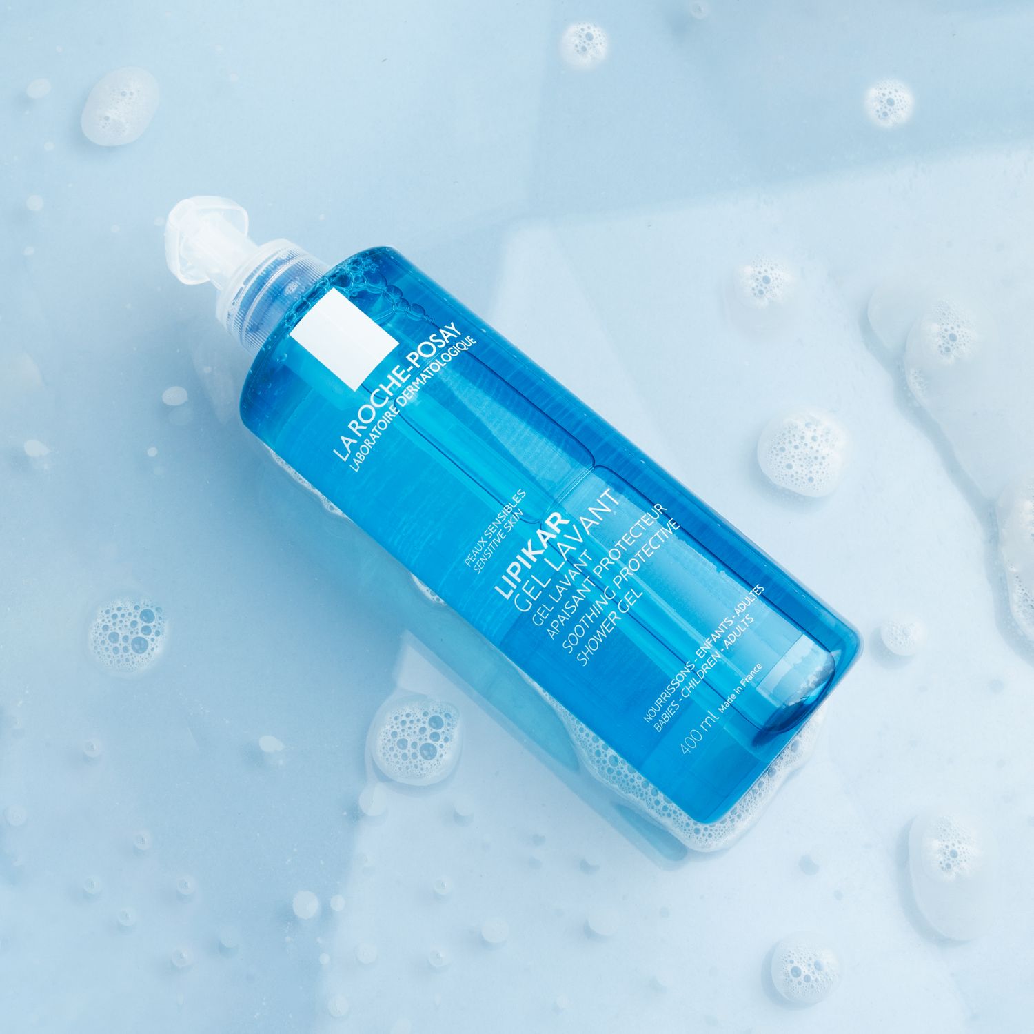 a blue skincare product bottle