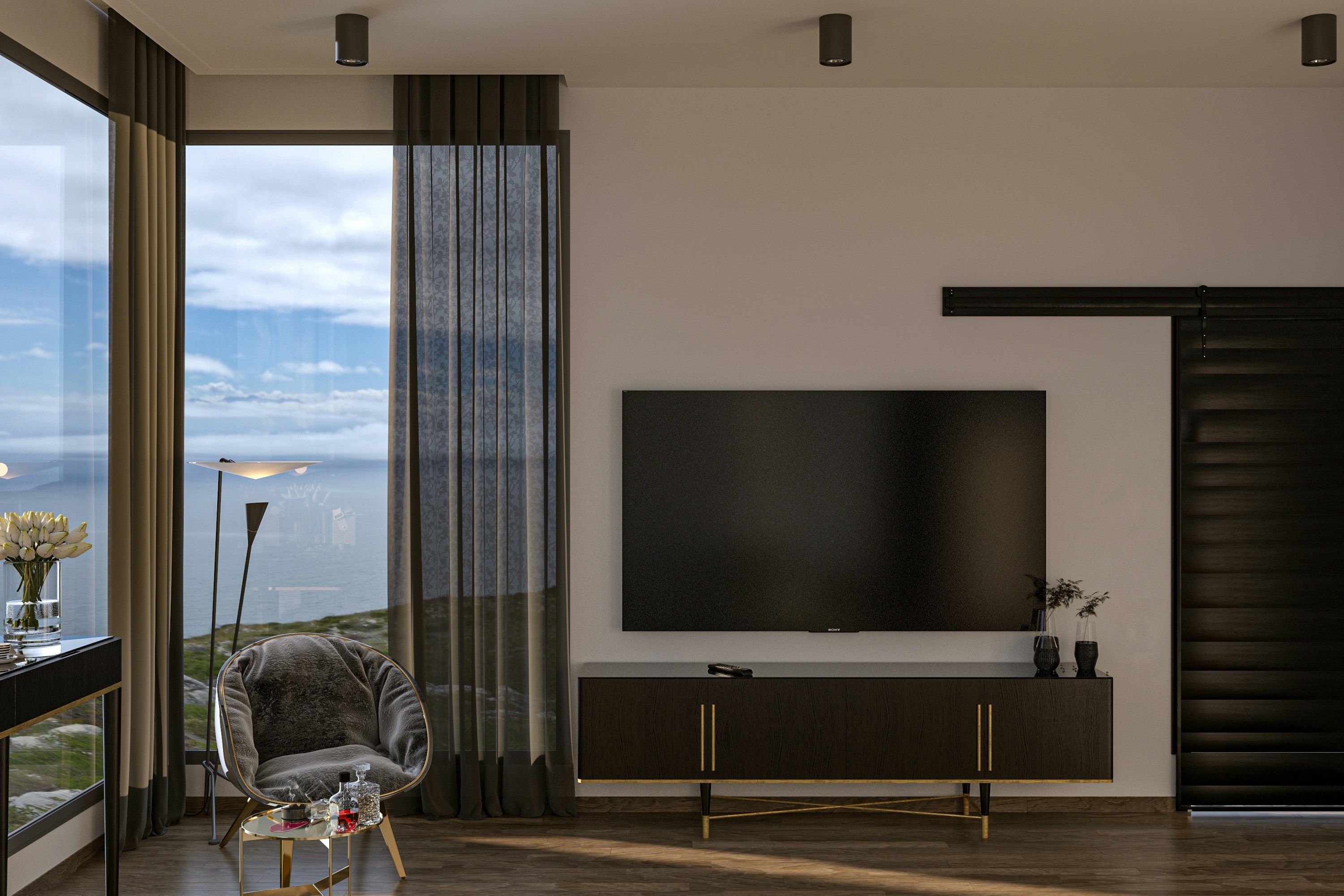 A living room with a large flat screen TV