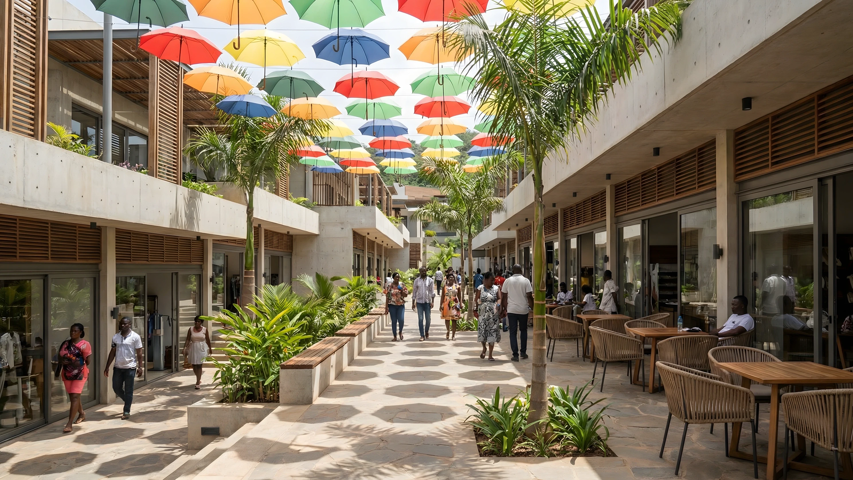 Rendered town square walkway lined with shops and cafes beneath a canopy of coloured umbrellas