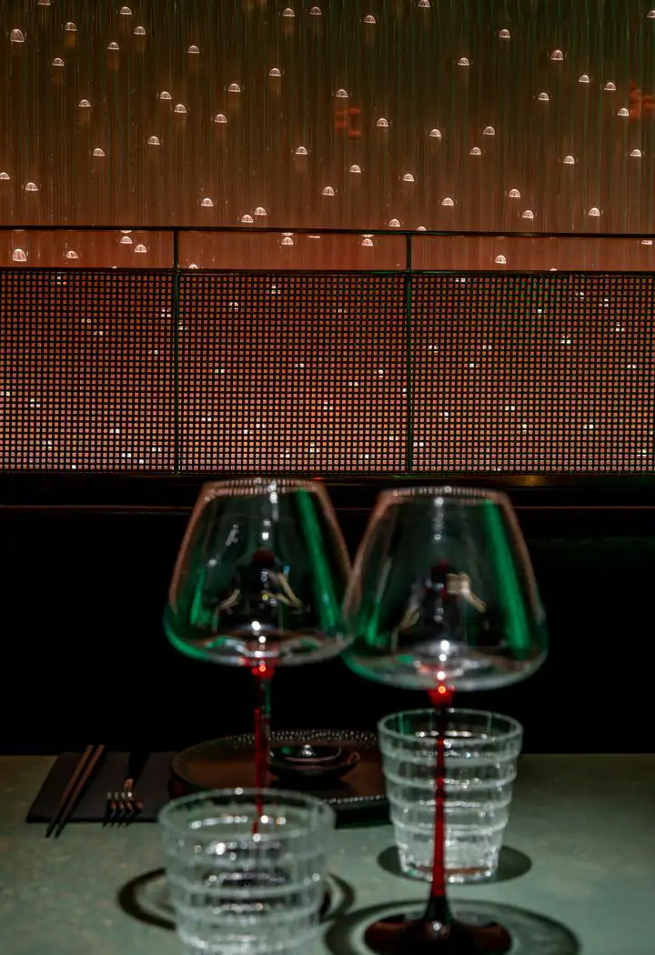 Wine glasses in front of the starry wall