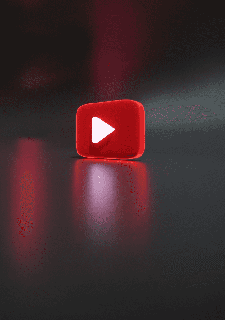 a red play button sitting on top of a table