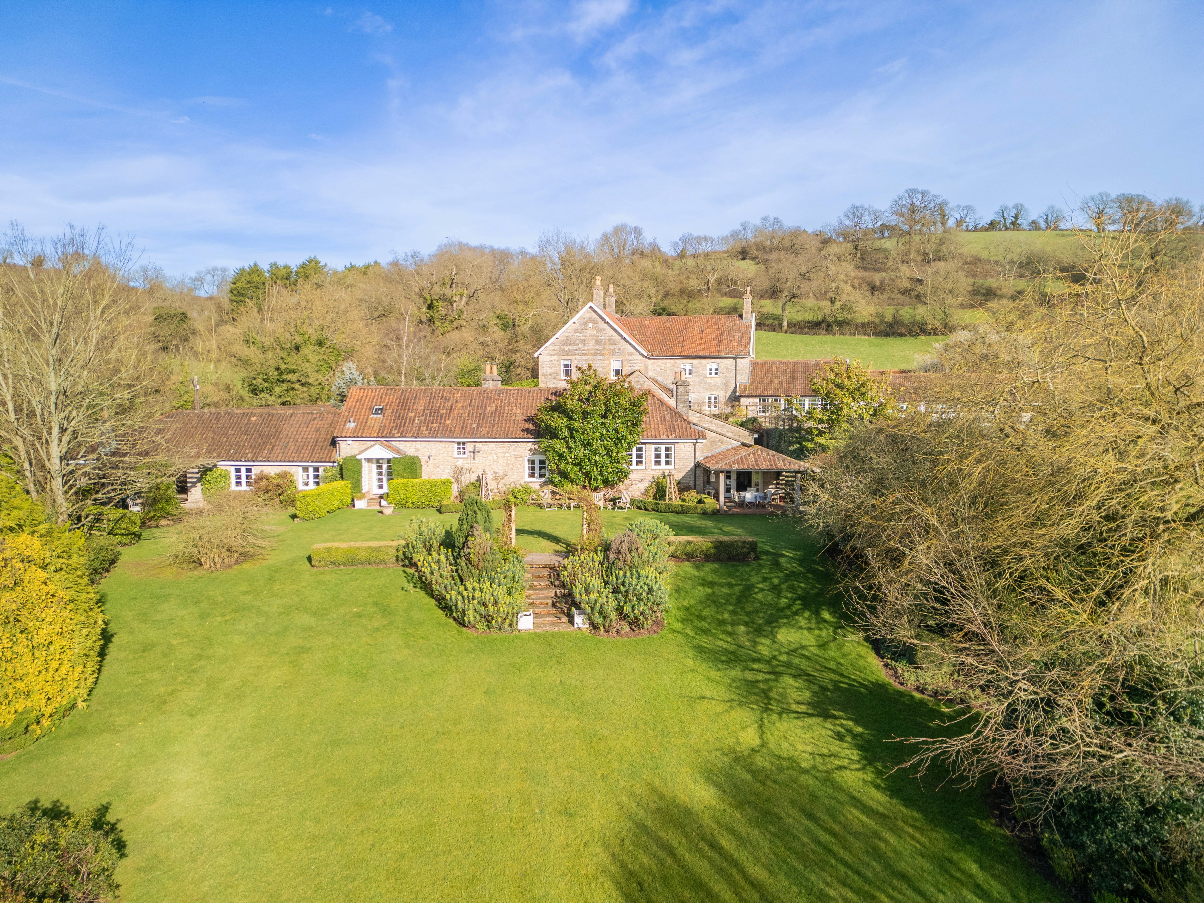 Aerial view of Washbourne Cottage and landscaped gardens
