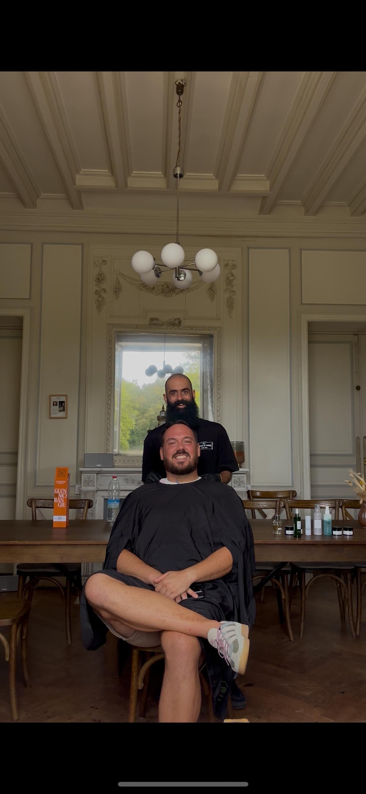 three person's standing front of field