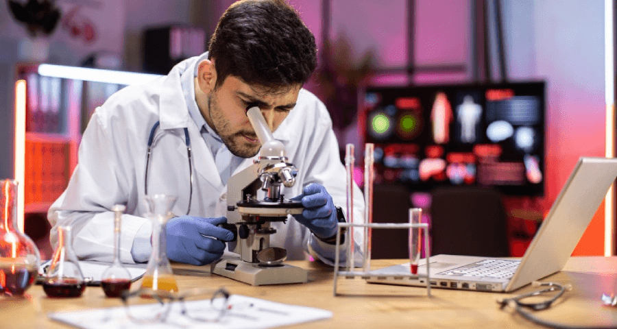 high school student reviewing a published research paper for college admissions portfolio
