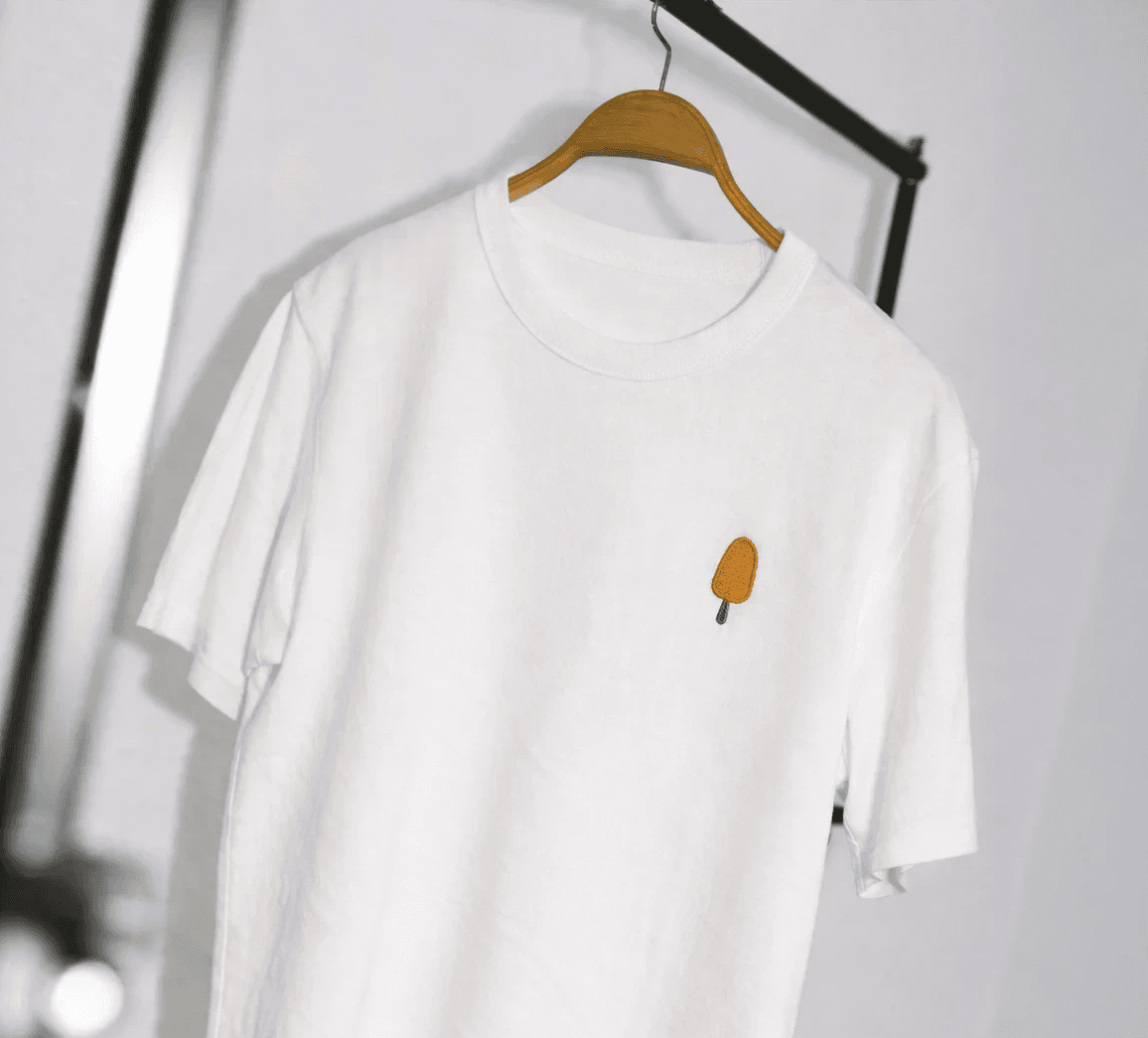 Single fresh lemon isolated on clean yellow backdrop