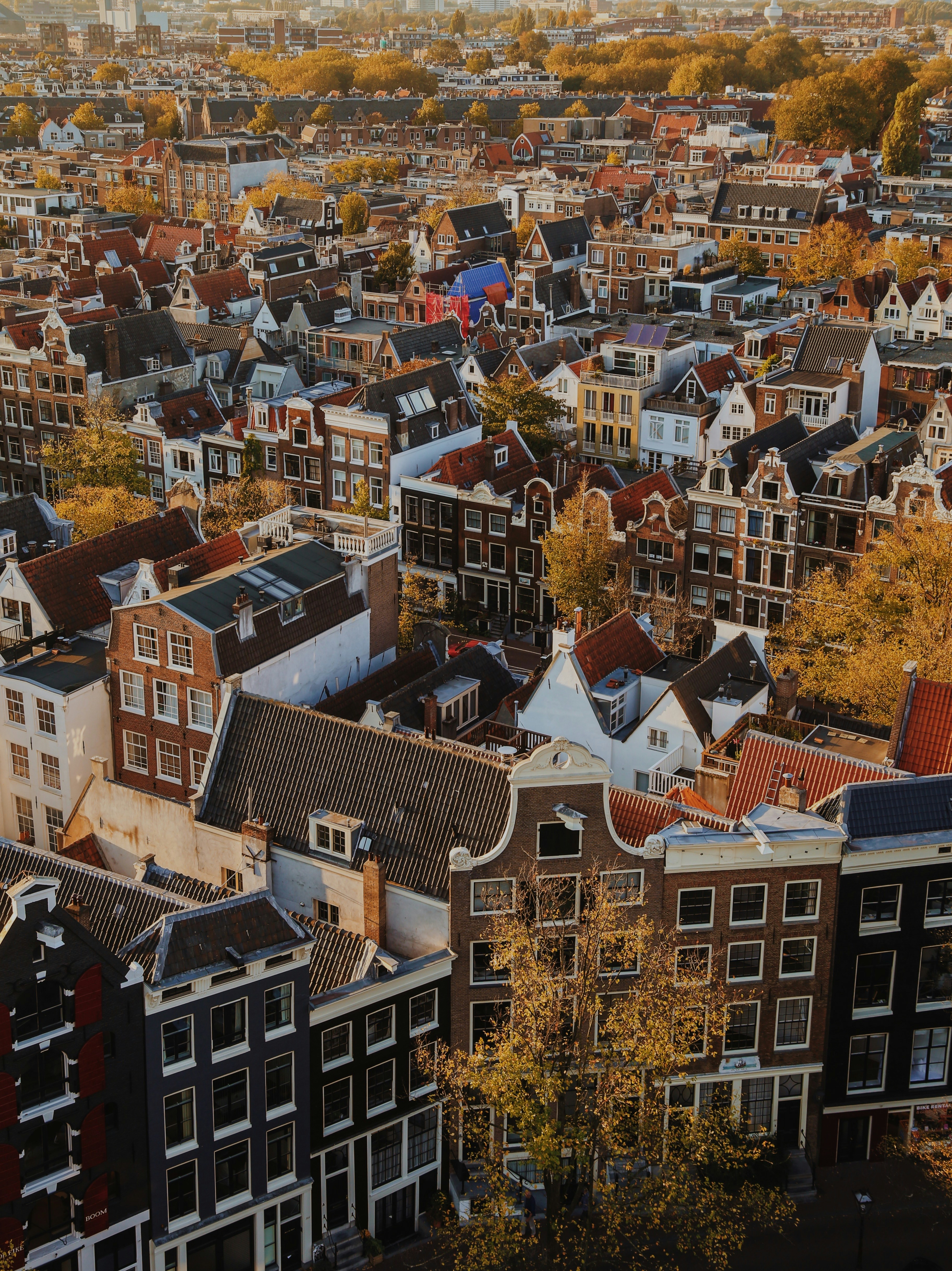 an aerial view of a city with lots of tall buildings