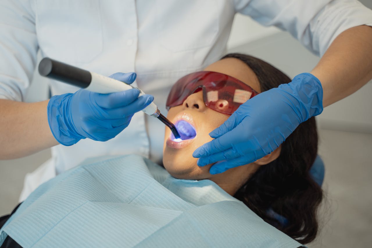 A dentist treating their patient