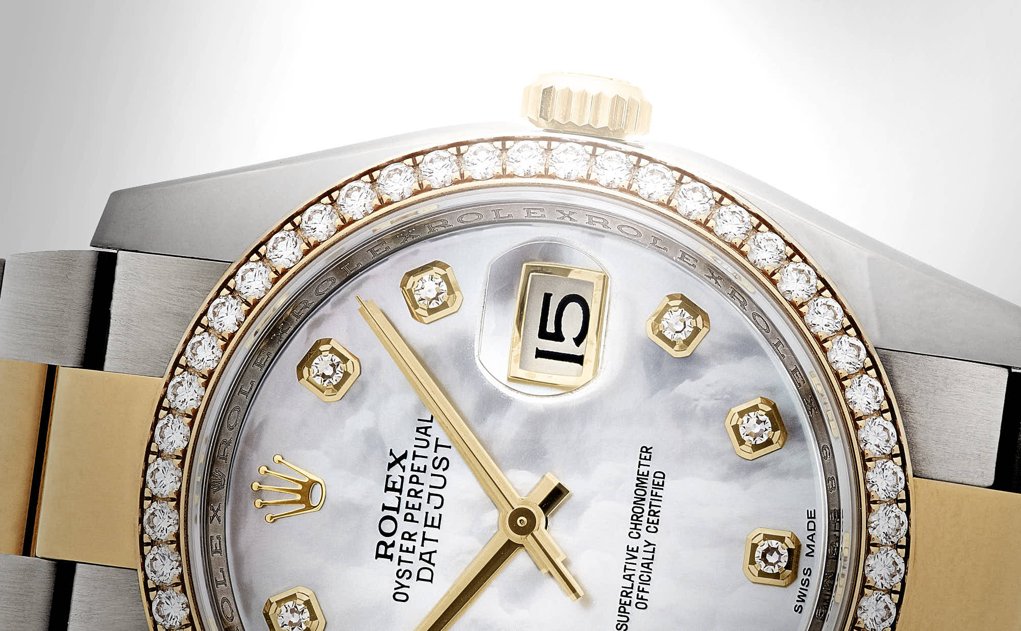 Luxury Rolex Datejust watch with diamond bezel and elegant design.