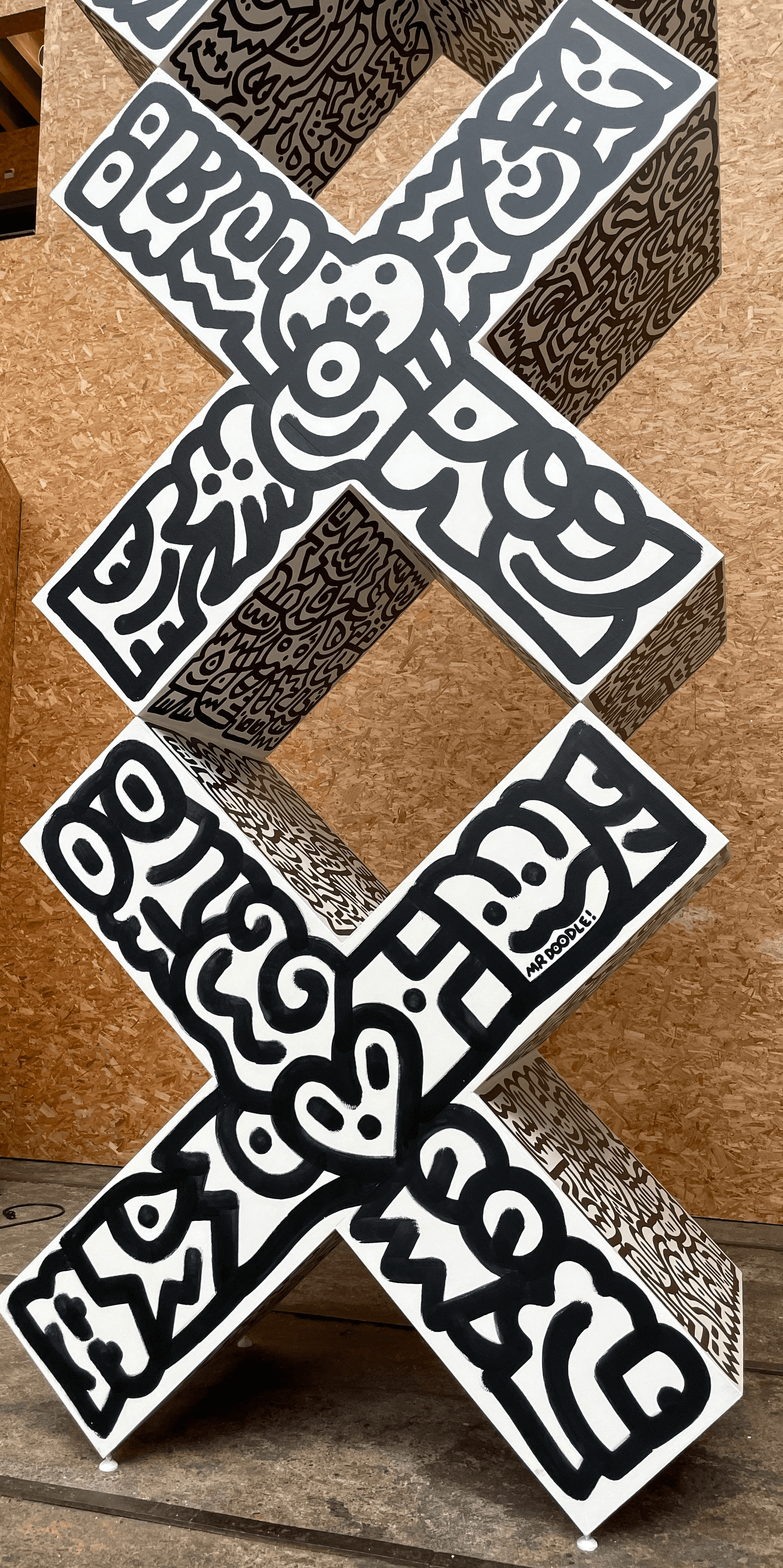 people in a large building with Tate Modern in the background