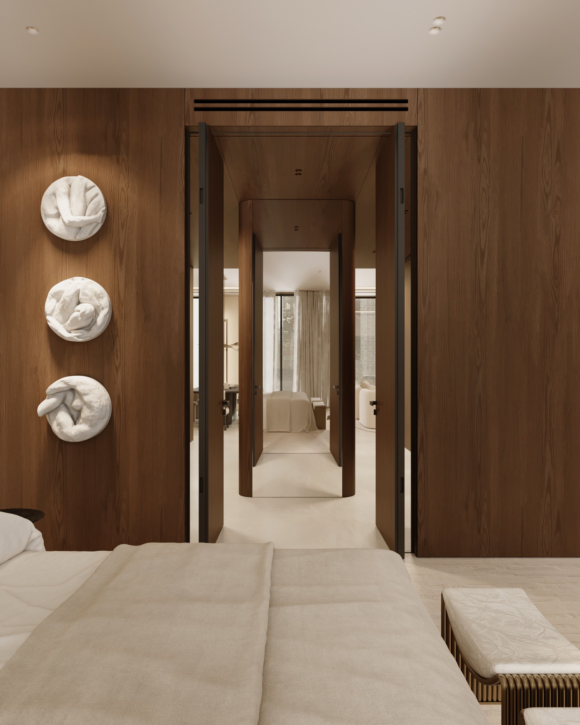 A modern bedroom featuring wooden accents, decorative wall plates, and a doorway leading to a bright hallway.