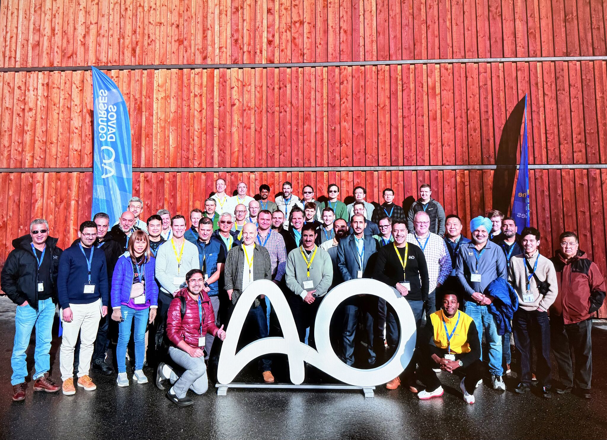 A couple holding hands on a ledge overlooking a glowing fantasy castle
