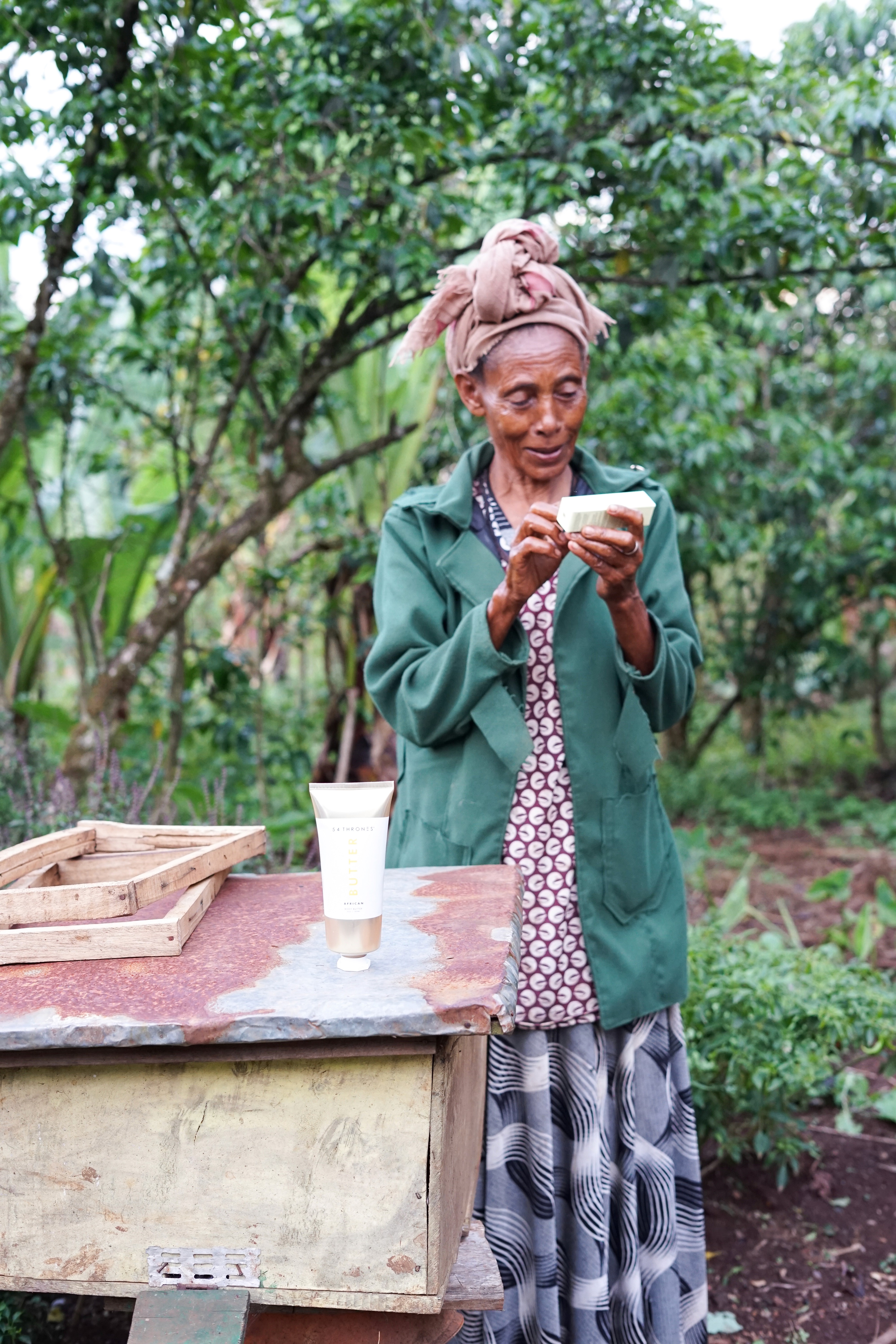 Abebech with 54 Thrones product with her honey - Ethiopia