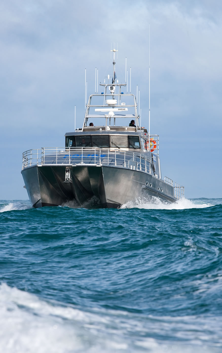 a statue of a woman holding a bird in her hand