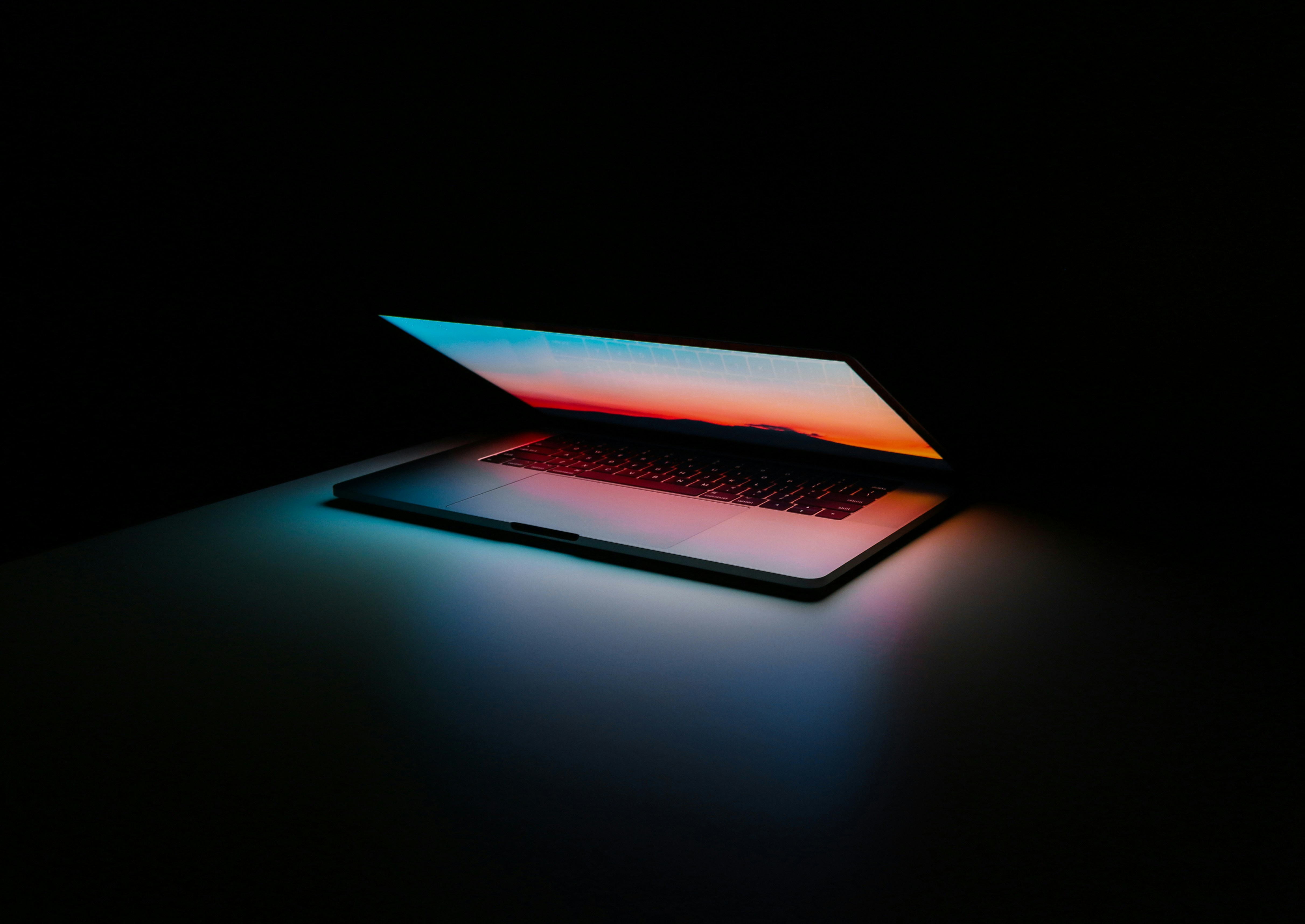 Laptop laying in Dark- How to Boost Your Productivity with AI Tools