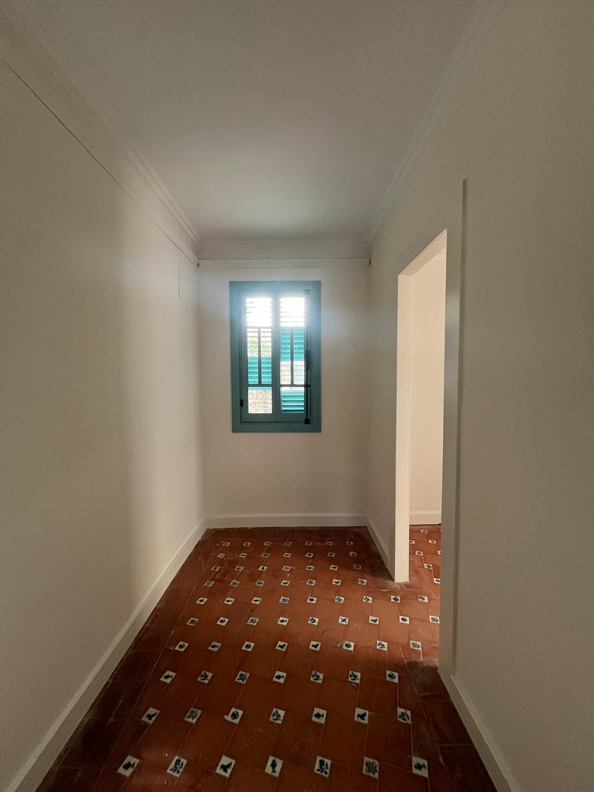 Interior de la caseta de nines rehabilitada
