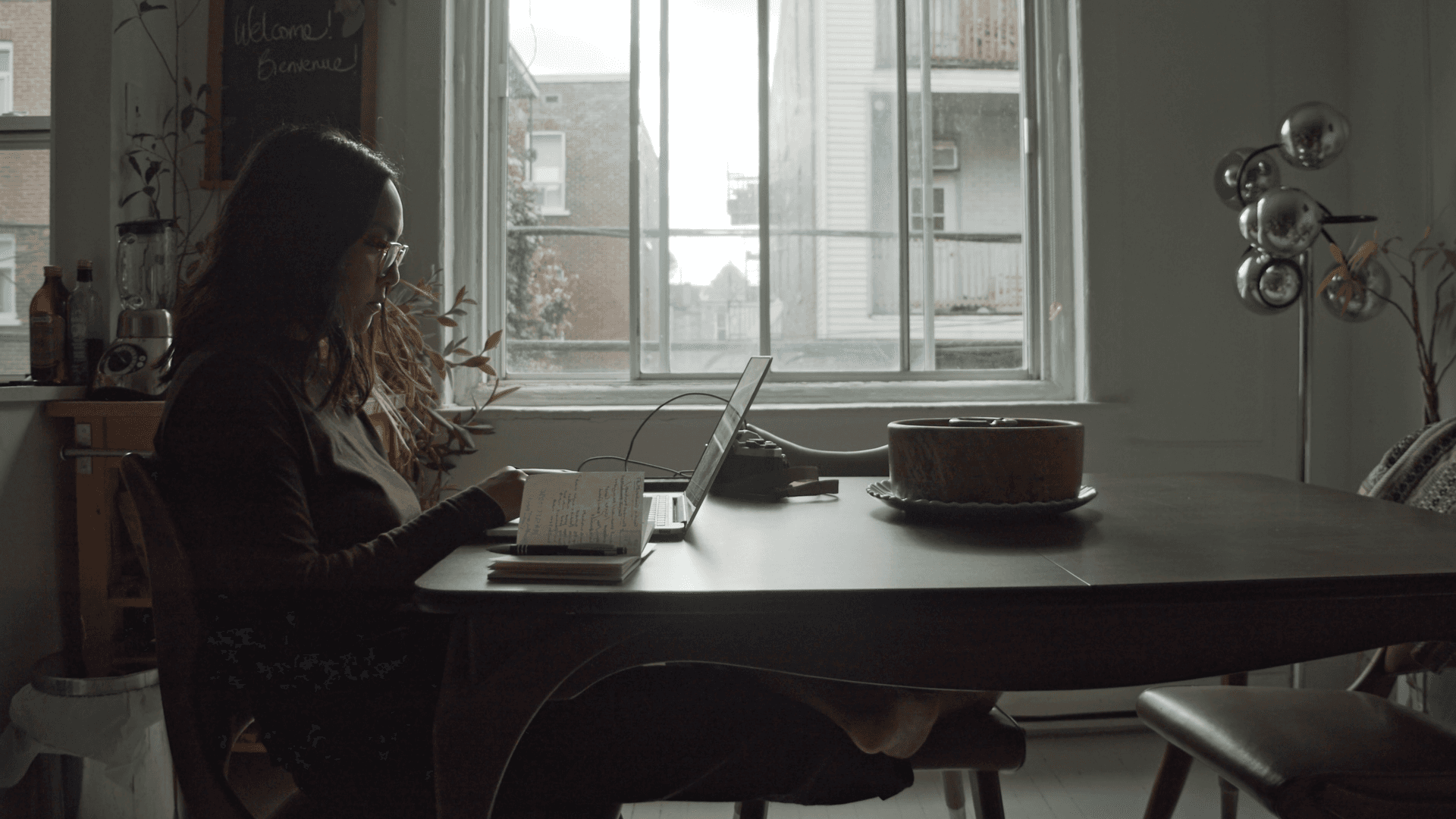 Woman using a computer.