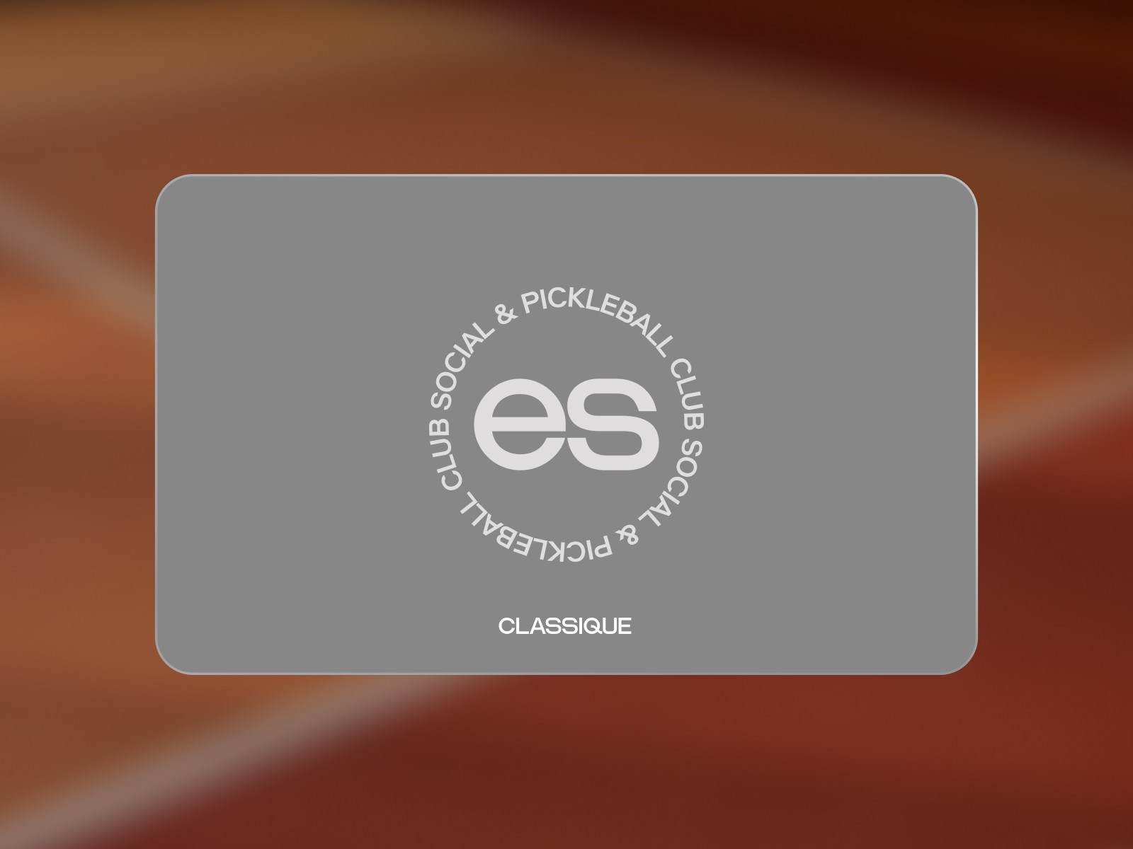 A woman hitting a tennis ball with a racquet