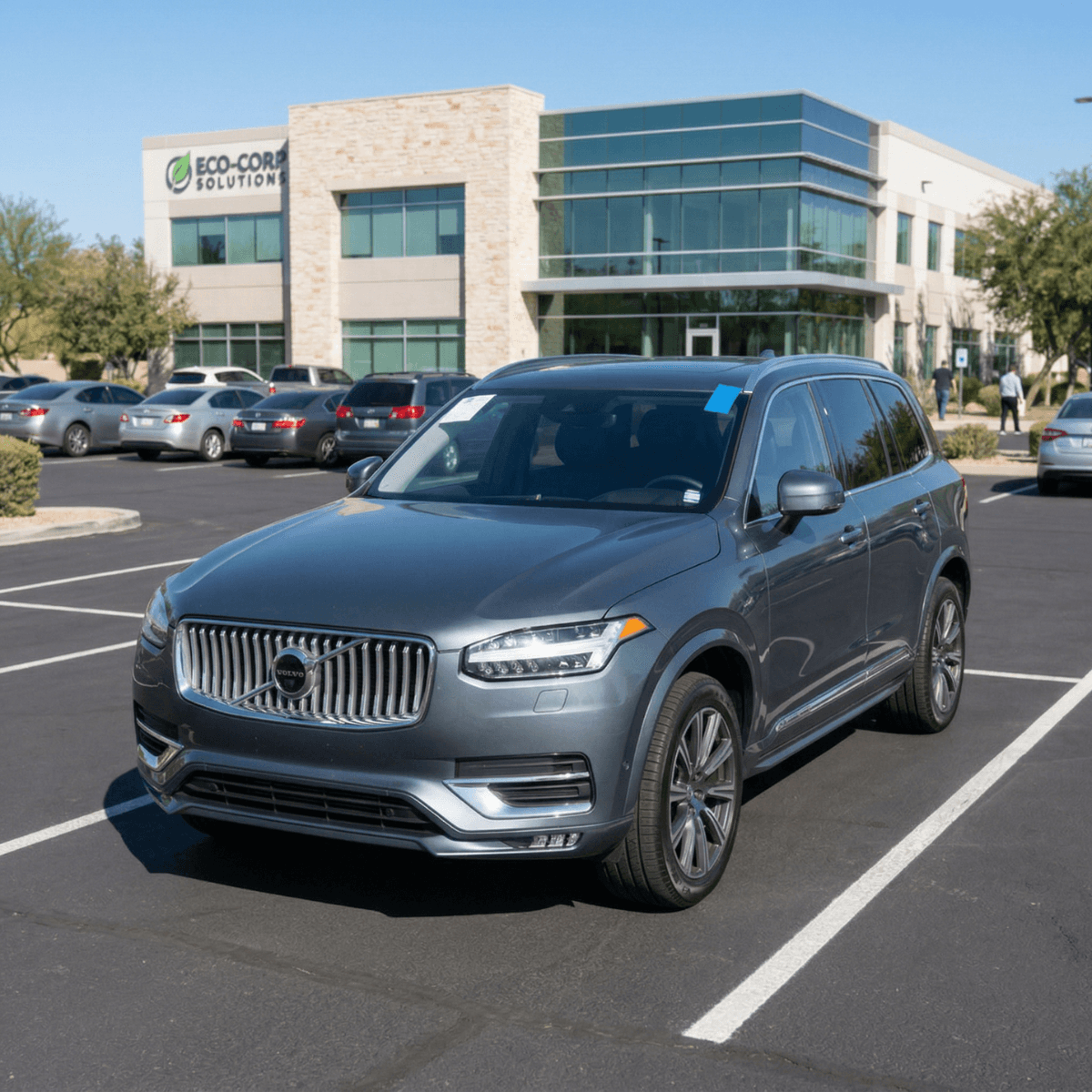Gray Volvo XC90 with a precision-fit replacement windshield in a Sedona, AZ business park parking lot
