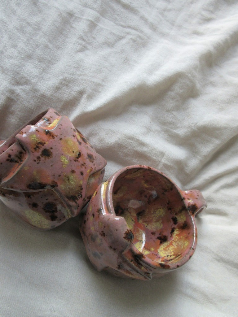 Pink and gold splatter-glazed ceramic mug