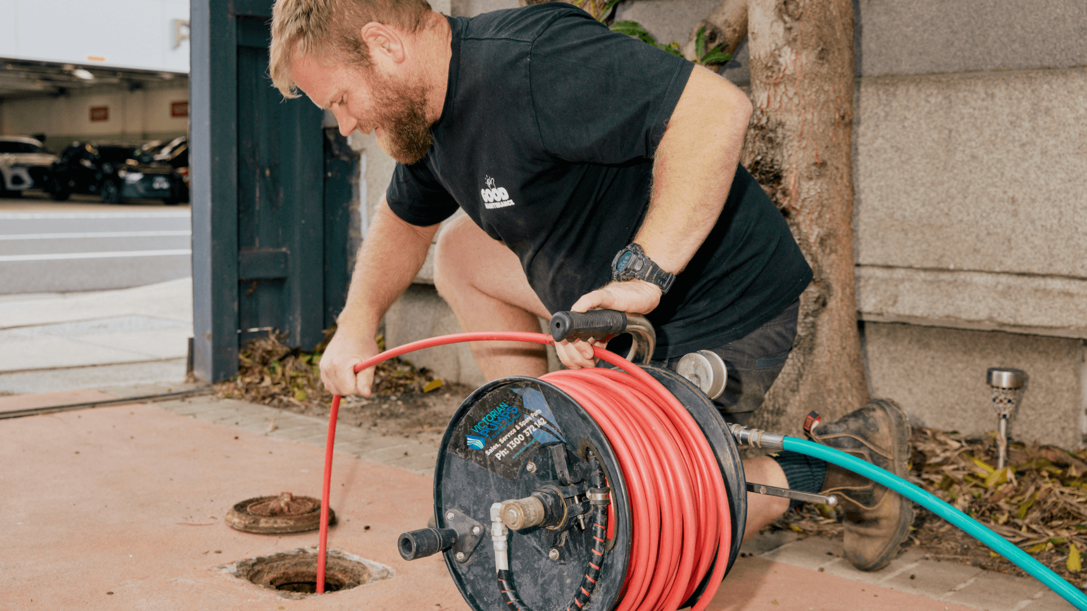 Good Maintenance Plumber unblocking a drain at a residential property.