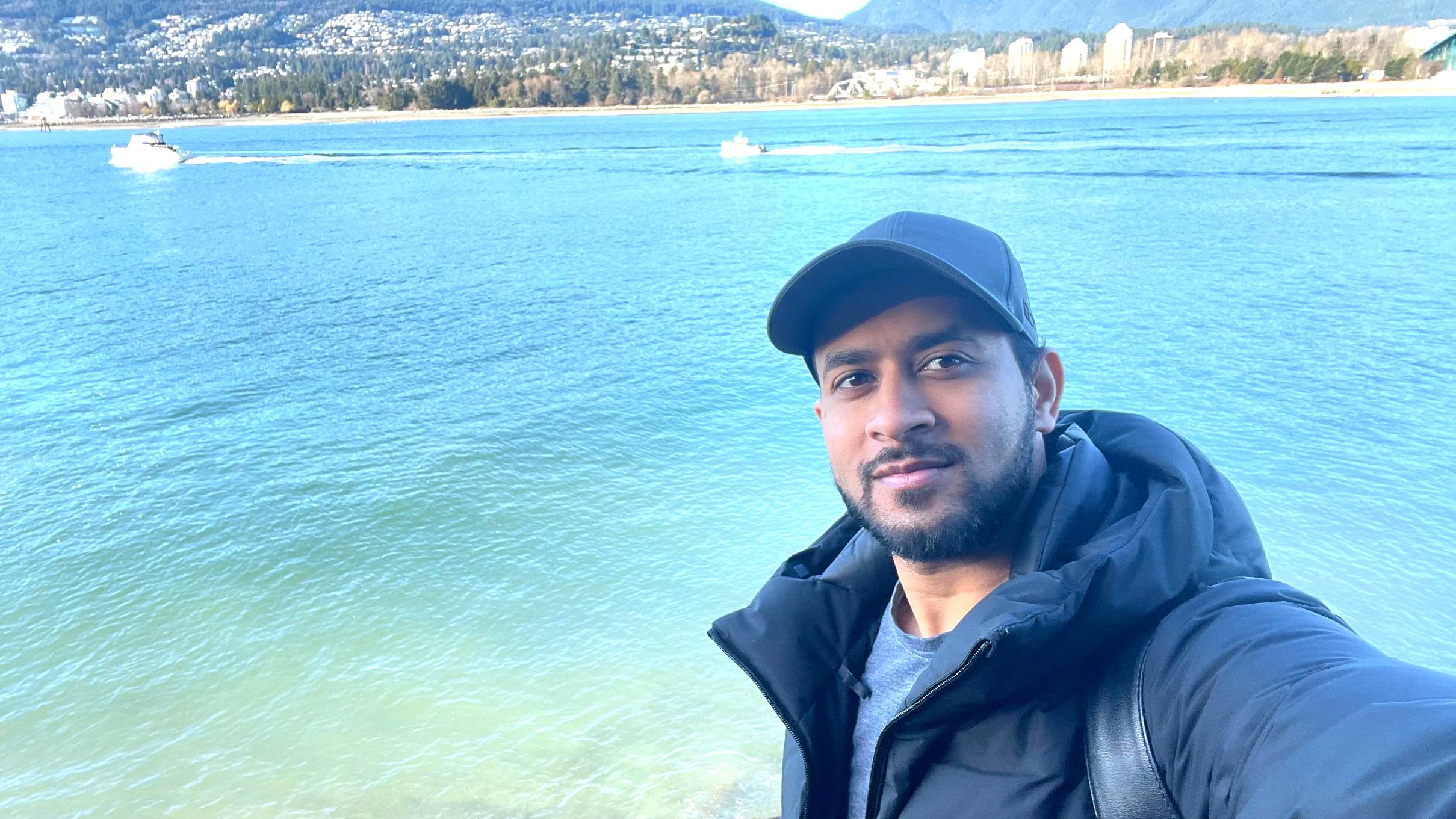 Atta Rahman working on design projects at desk