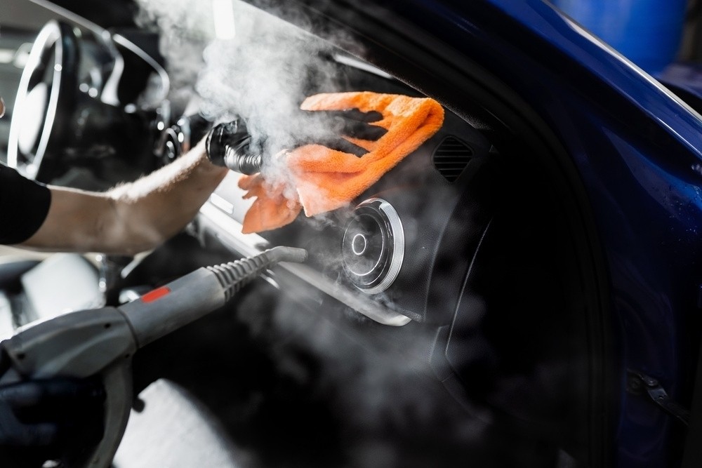 Steam cleaning a vehicle interior