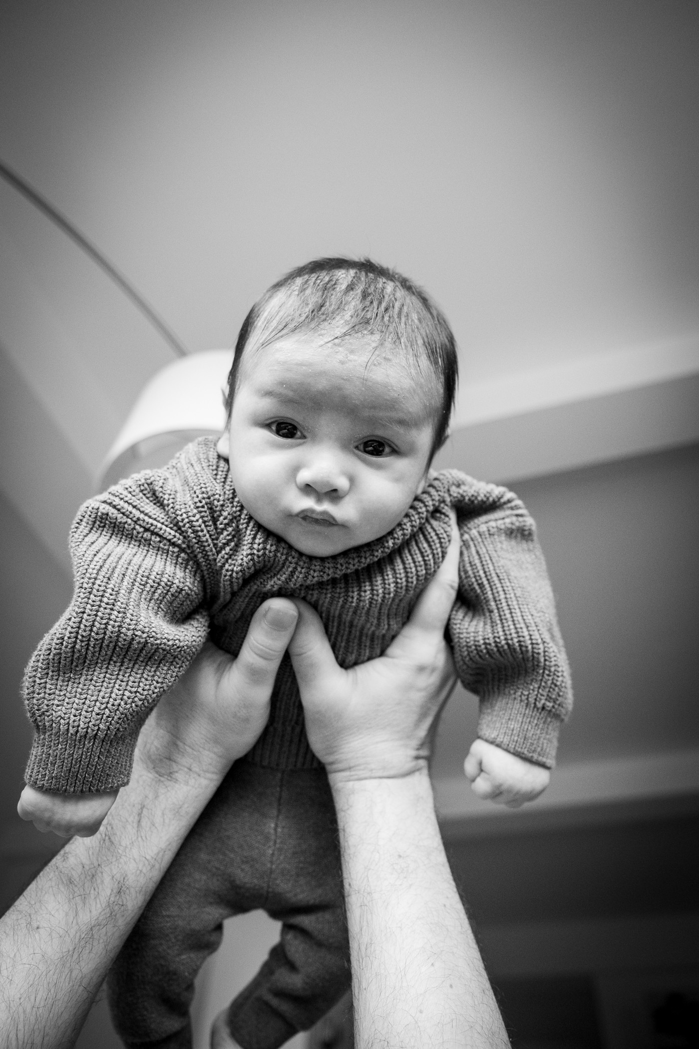 candid-father-holding-baby-black-and-white-portrait-new-york