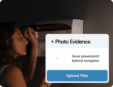 Worker uploading a photo as evidence through a digital interface labelled “Photo Evidence,” showing task verification in progress.