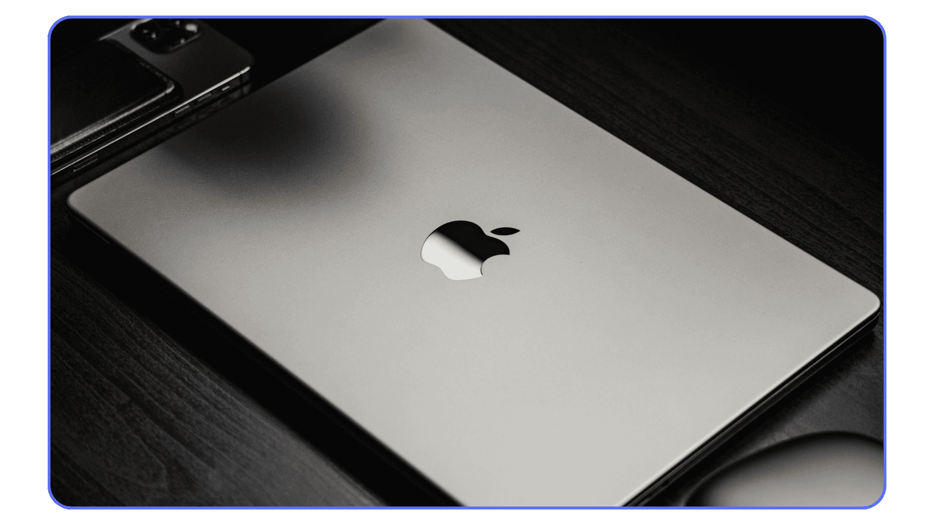 Closed Apple MacBook Pro placed on a desk, showing minimalist aluminum design