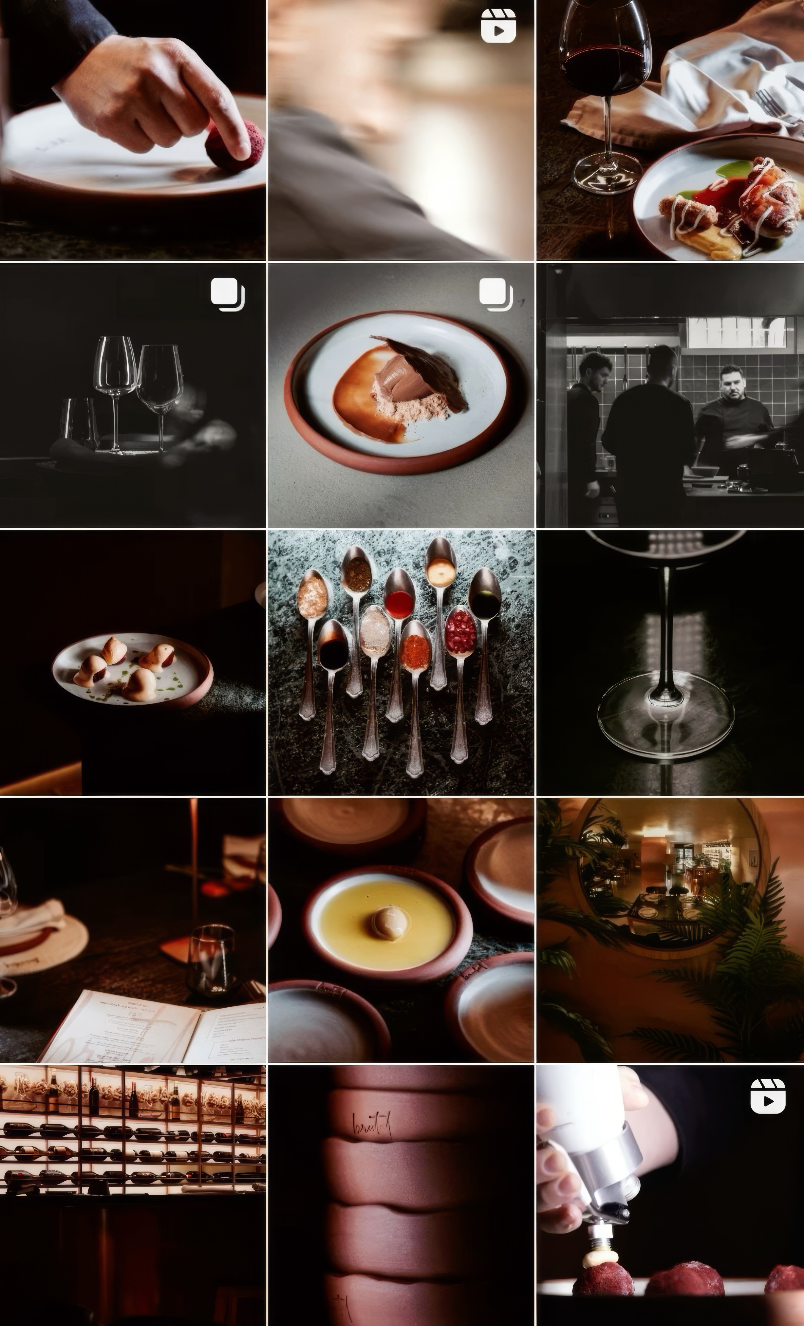 Portrait of a curly-haired man in a rust-and-white striped knit sweater under a clear blue sky—modern fashion look.
