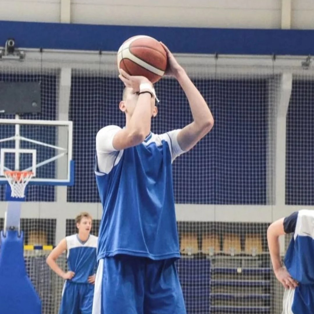 Sara is a client smiling to the camera happily