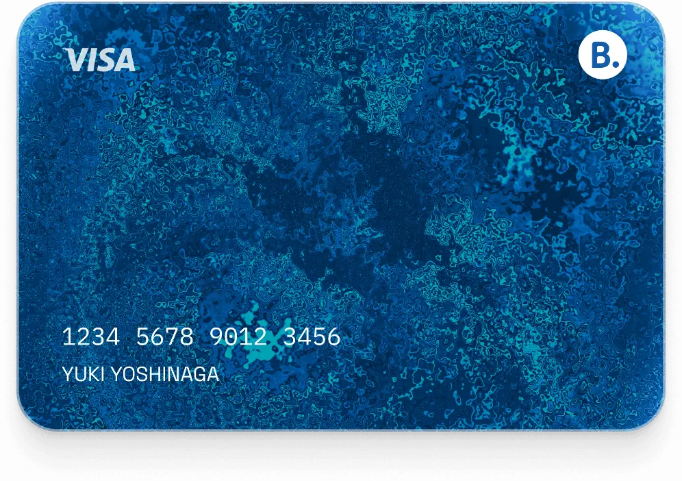 Blue Visa credit card with abstract texture, displaying card number, cardholder name Yuki Yoshinaga, and B. bank logo.