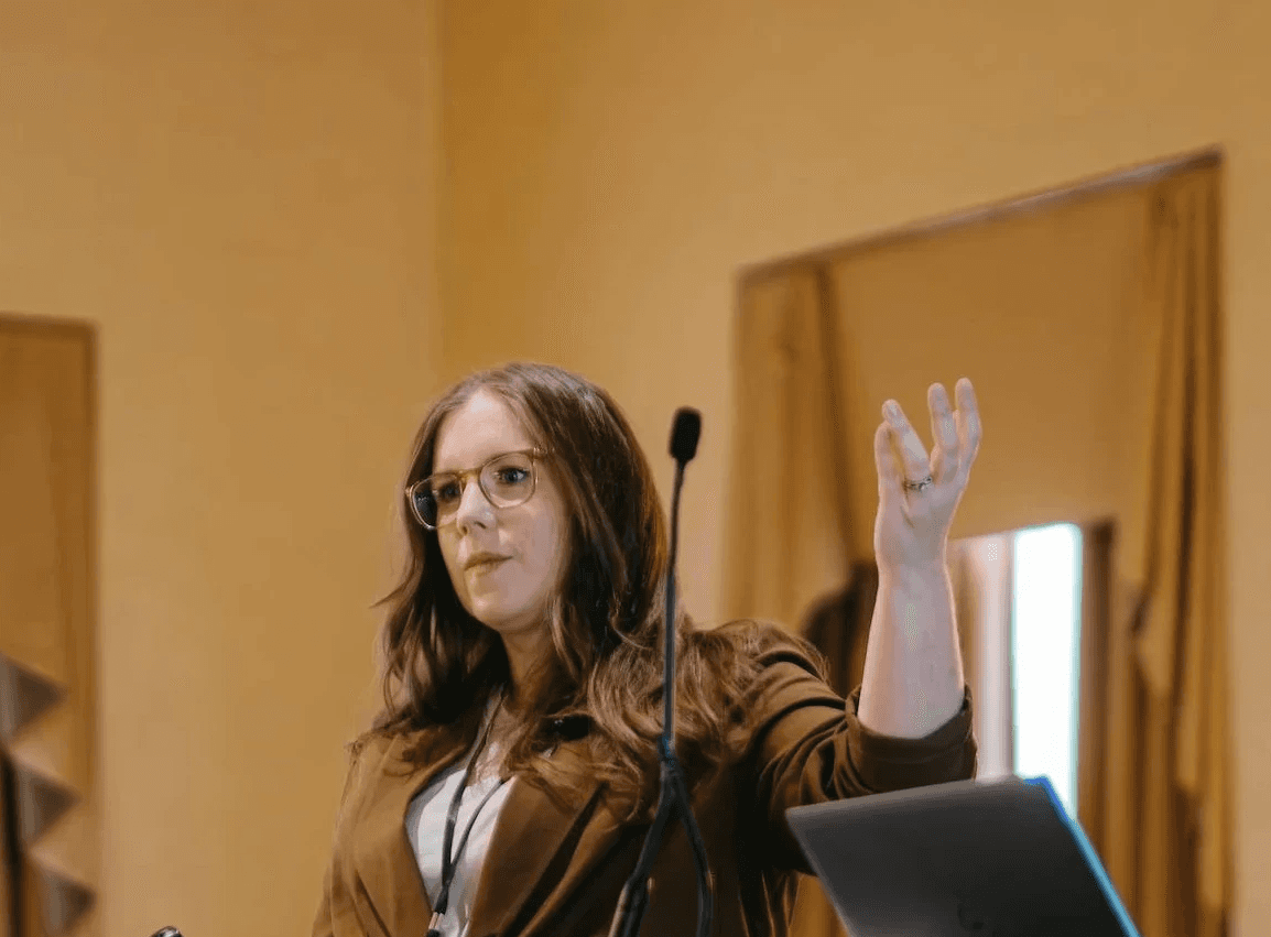 Workplace mental health consultant Erin Wasson looks toward the viewer