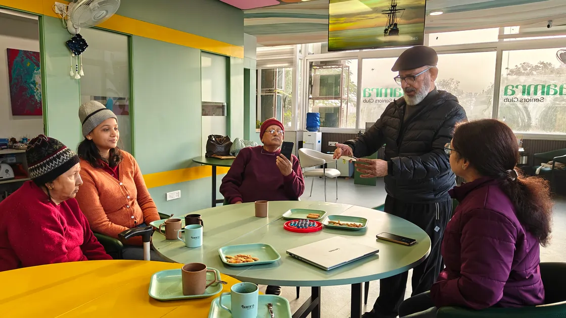 Learning how to sue camera for senior citizens at Aamra Seniors Club Gurgaon