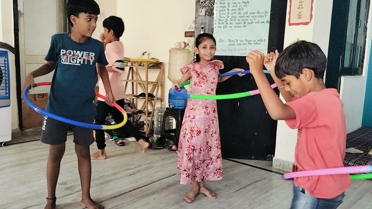 Close-up of blue flowers, glistening with droplets of water, creating a serene and calming atmosphere.