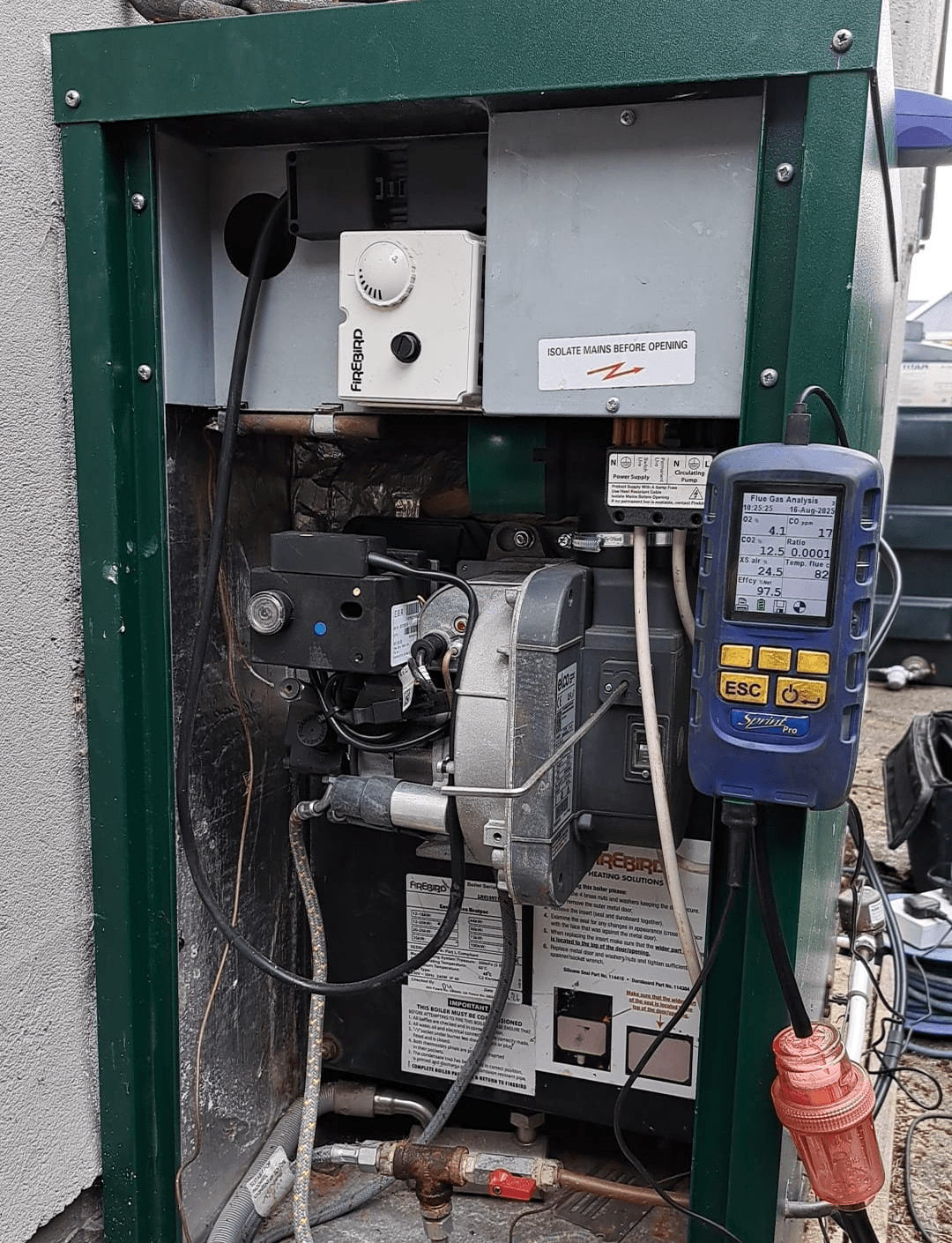 a man working on a machine in a factory