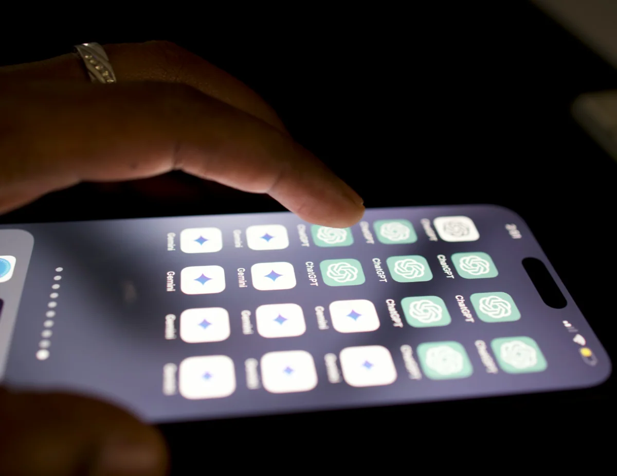 a close up of a person touching a cell phone