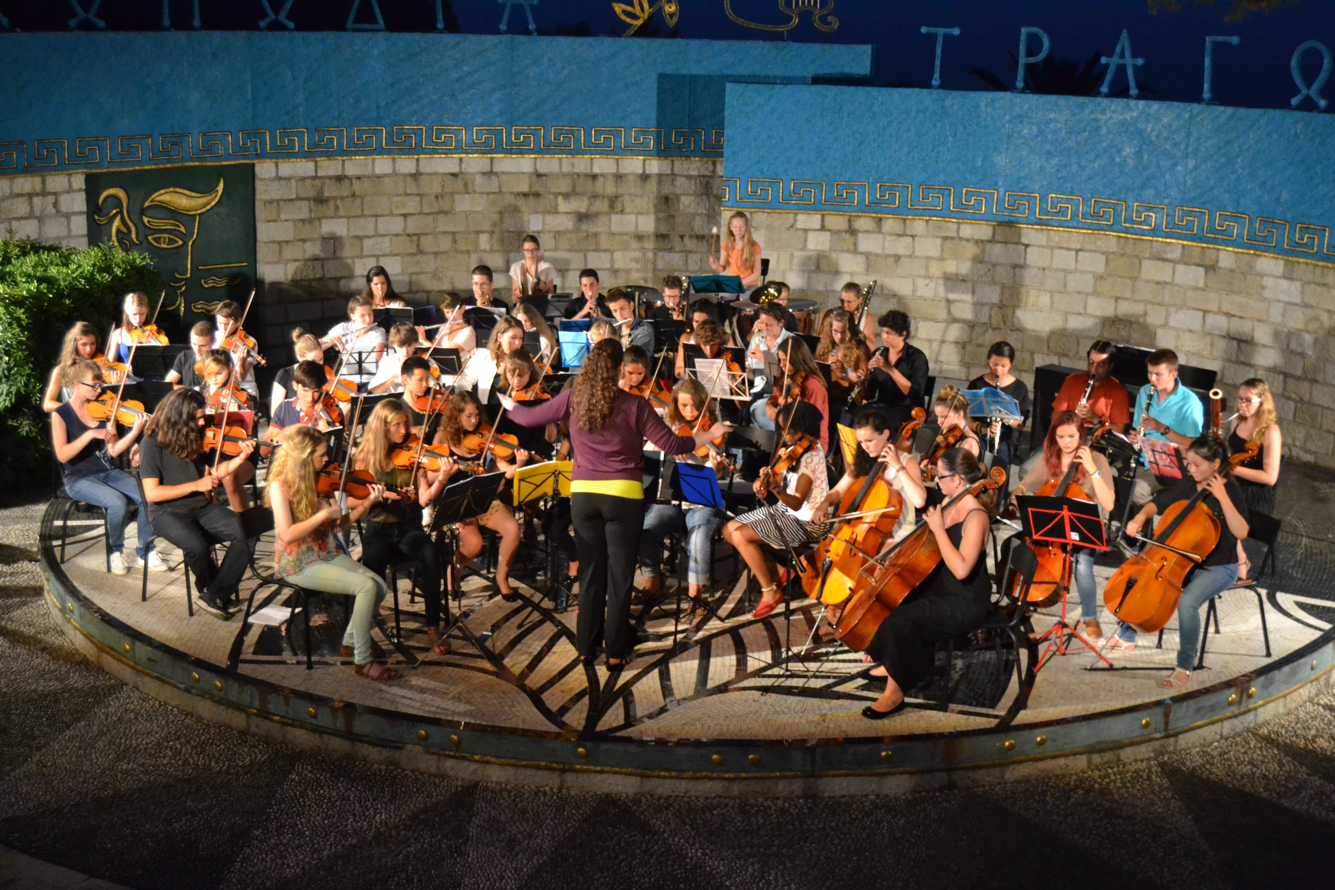 woman in black t-shirt holding smartphone
