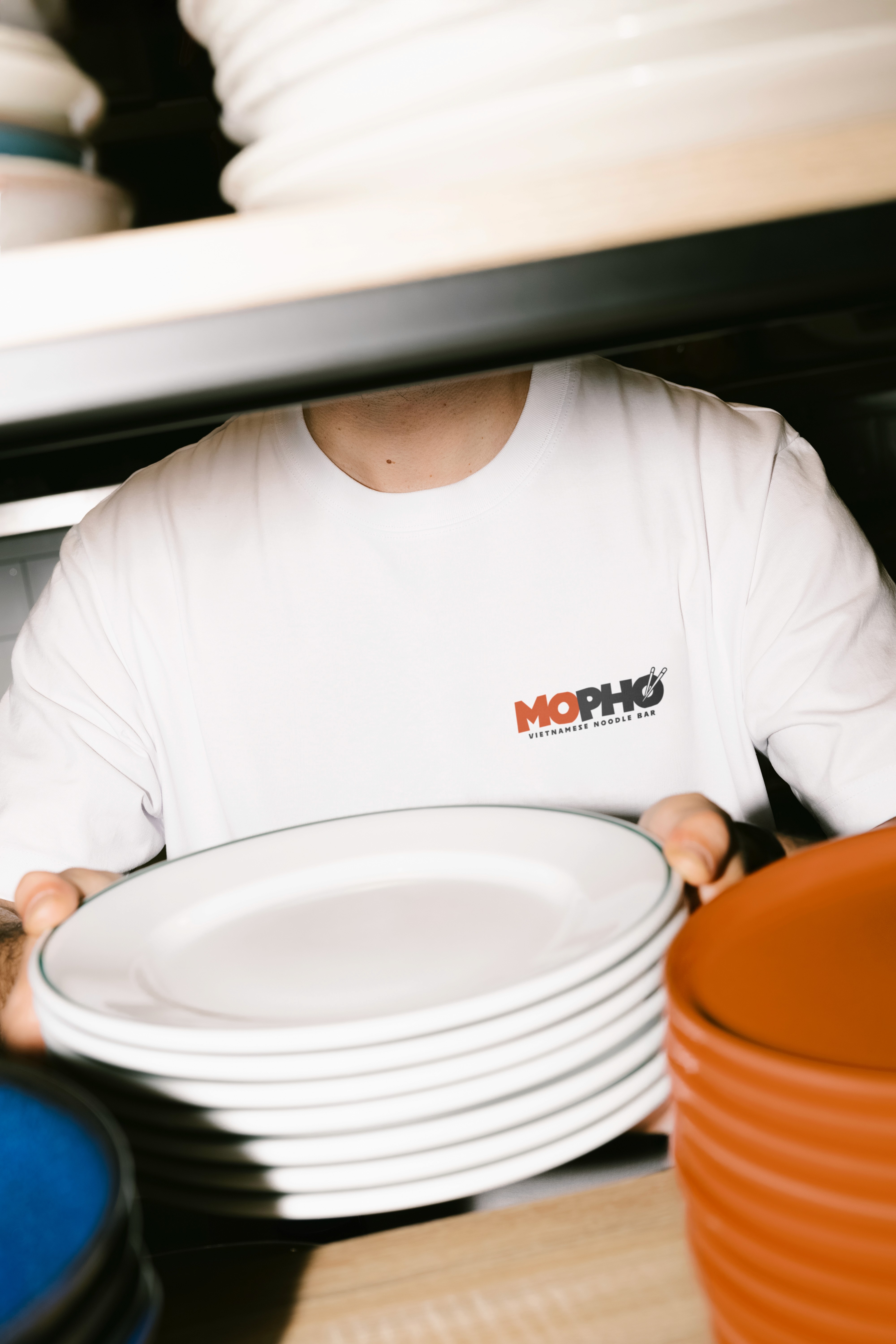 Minimalist uniform design for Mopho using one of the logo options