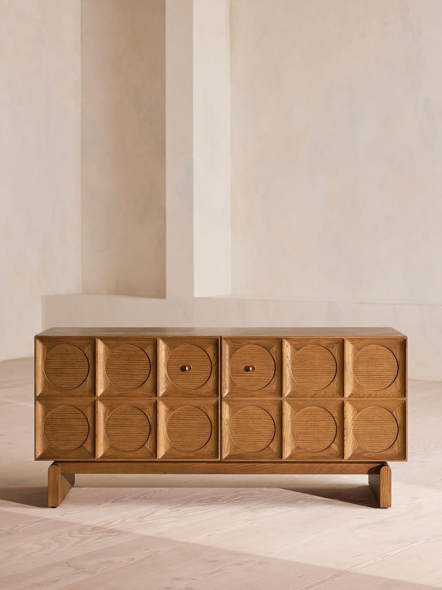 The toilet between the living and dining areas was removed to make space for a library corner. The miniature pottery is by Rakhee Kane.Ishita Sitwala